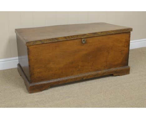 An antique elm Blanket Chest with interior candle box, on shallow bracket feet, 3ft W x 1ft 6in D