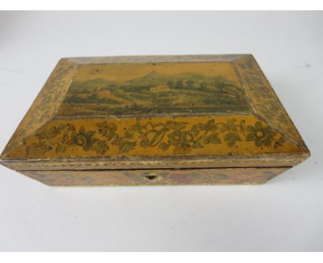 A painted wooden Playing Card Casket with gold paper edging. Central scene of a country landscape. Containing some ivory mark