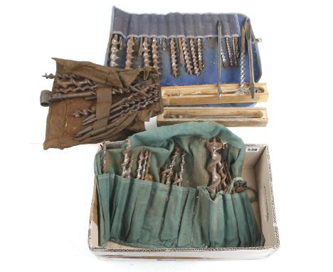 Two expansive bits and 3 rolls of twist bits, light rust to some G 