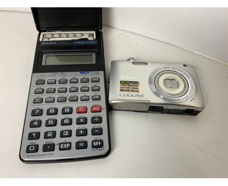 Casio Fraction Calculator and Nikon Coolpix Camera 