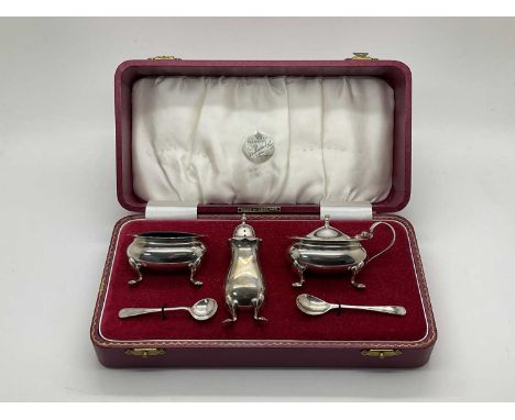 A Hallmarked Silver Cruet Set, Barker Ellis Silver Co, Birmingham 1964, comprising pepperette, salt cellar, and lidded mustar