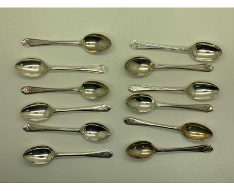 Walker &amp; Hall; A Set of Twelve Hallmarked Silver Golfing Coffee Spoons, Sheffield 1933, baring golfing emblem to handle (