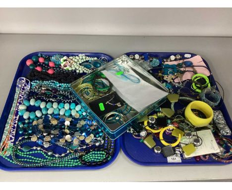 An Assortment of Costume Jewellery, in hues of blue and green, to include statement bangle, beaded necklace, novelty drop ear