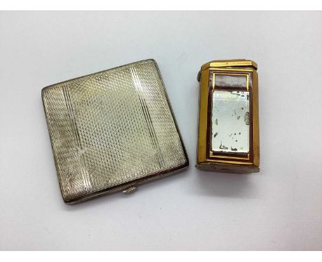 A Hallmarked Silver Powder Compact, E.S&amp;Co, (hallmark rubbed), of square form and allover engine turned design, (85grams)