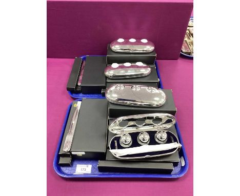 Eight Plated Fountain Pen and Inkwell Sets, of plain modern design with blue lining, together with ten modern letter openers,