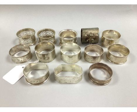 A Collection of Assorted Hallmarked Silver Napkin Rings, including initialled, engine turned, etc (170grams); further napkin 
