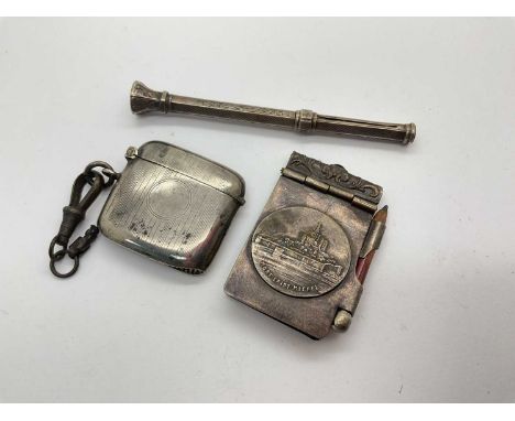An Art Deco Hallmarked Silver Vesta Case, Birmingham 1922, of allover engine turned design with vacant circular cartouche cen