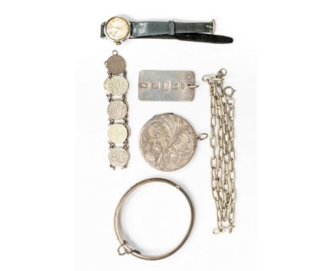 Five items of silver jewellery comprising a bangle, an ingot pendant,  a 3d bracelet, a locket and a chain; together with a w