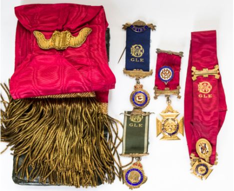A small collection of Robin Hood Lodge buffalo silver gilt badges and ribbons comprising two silver gilt badges, a pendant ri