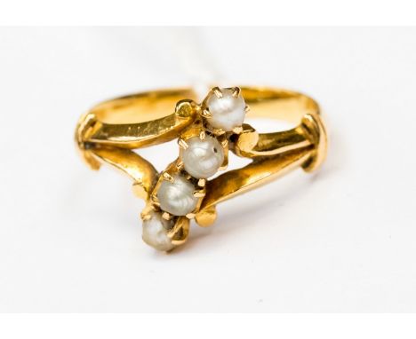 A 19th Century high carat gold and four natural pearl ring, probably 22ct, size P½, 5.6 grams approx 