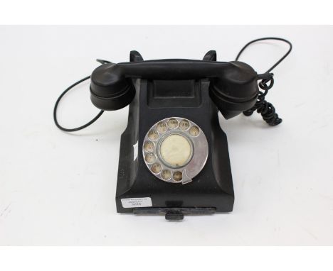 A black vintage telephone 