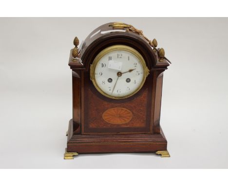 An Edwardian table/mantle clock with inlaid detail, enamel dial, Arabic numerals with key and mahogany casing