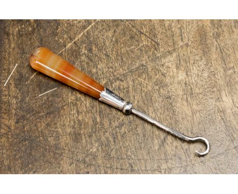 A silver button hook, hallmarked Birmingham, in original box.