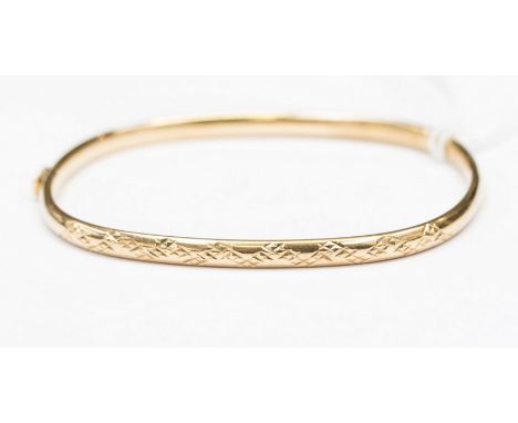 A 9ct gold hinged bangle, hollow construction, 5.0 grams approx 