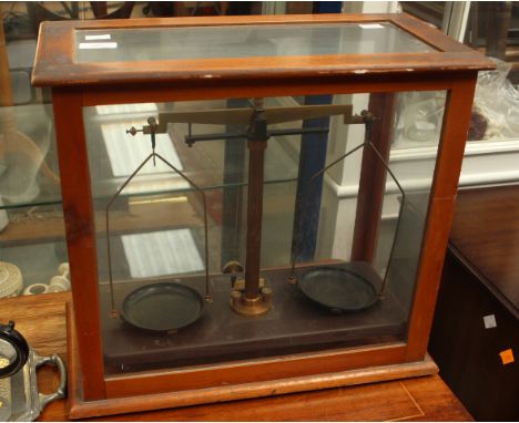 A glazed cased set of scales Griffin and Tatlock Ltd 