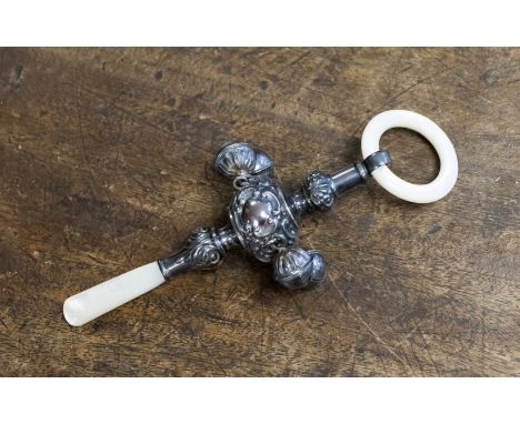 A silver baby's rattle, mother of pearl fittings, Birmingham 1913, maker Saunders and Shepherd 