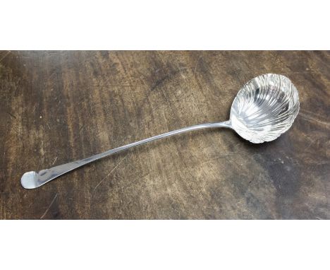 An early George III silver soup ladle Hanoverian pattern with a shell style bowl, free of initials, maker William Turner, bot