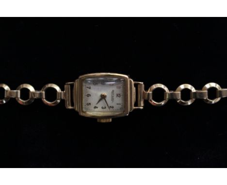A ladies 9ct. gold Rotary ladies bracelet watch, winder is rolled gold, original box
