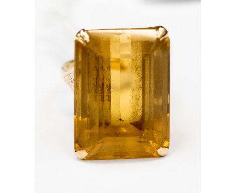 A 9ct gold ring, set with a rectangular citrine 