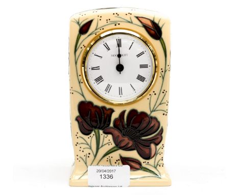 A Moorcroft mantle clock in the Chocolate Cosmos pattern, designed by Rachel Bishop, dated 2013 