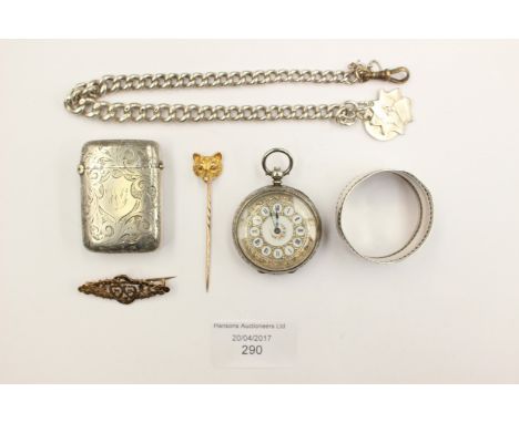 A silver plated vesta case, chased engraving, a sterling silver napkin ring, a Continental ladies .935 silver watch and a sil