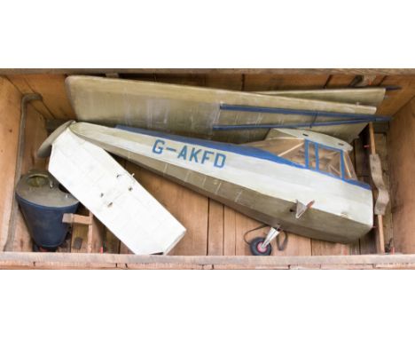 A cased model plane, in parts for storage, possibly scratch built to a scale