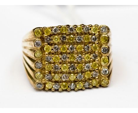 A 9ct QVC square cluster ring set with clear and yellow stones that test as diamonds (small stones) gross weight 6.2 grams ap