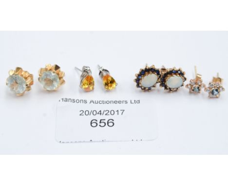 A collection of earrings including 18ct gold, 9ct and opal, etc 