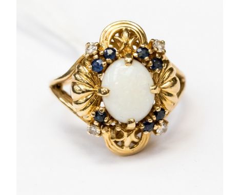 A 14ct. Franklin Mint opal ring, studded with diamonds and sapphires