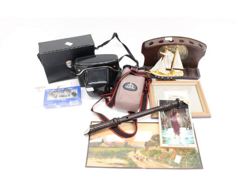 A cased Pentacon Camera, a cased pair of binoculars, a Pentax Zoom 70 SLR and booklet etc (1 box)