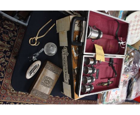 A cased trowel bar, Ronson lighter, cigarette box, match striker and cork puller, etc 