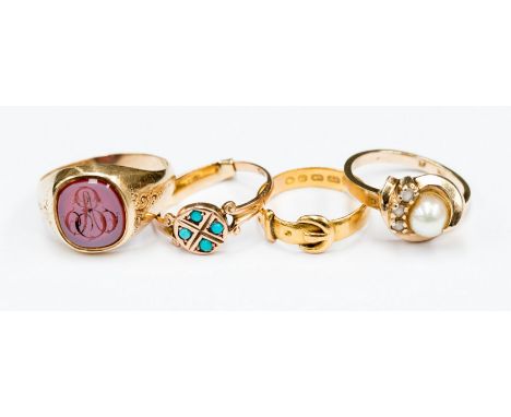 A 22ct 'belt' wedding band, a ring set agate with intaglio monogram and two other rings (4) 