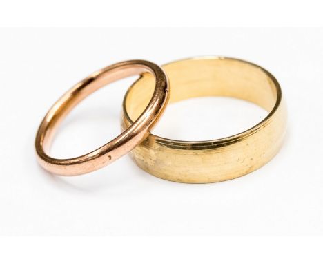 A 9ct. rose gold wedding band approx 2mm, ring size K 1/2, gross weight approx 2.0gms, together with a yellow metal wedding b