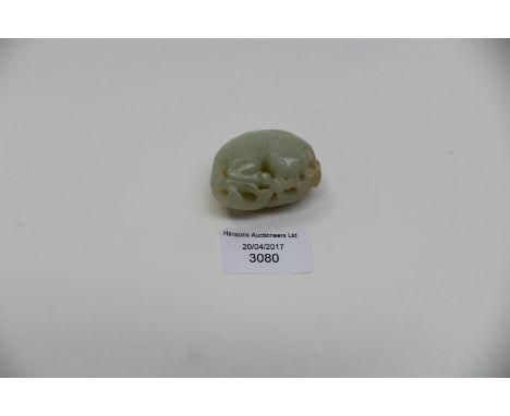  A pale jade pebble pendant: Lion Cub 