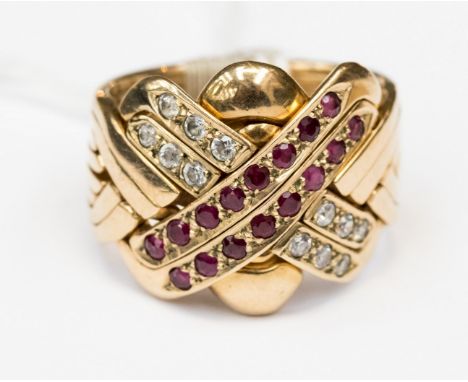 A ruby and diamond set 18ct gold band ring, 15.3 grams approx 