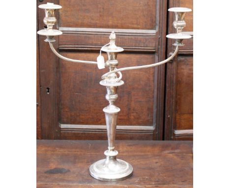 A George III style silver plated two branch candelabra, the centre with a removable finial, standing on a turned column and a