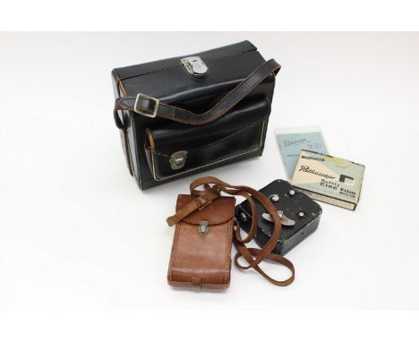 A Kodak Bellows camera in leather case. A Pathescope cine camera, film and booklet and a leather cased cine camera Pal Panda 