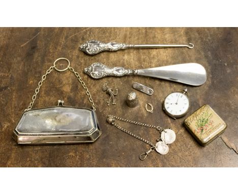 A collection of silverware, shoe horn and button hook, thimble and pocket watches and plated  (1 bag)