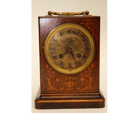 A rosewood and satinwood inlaid carriage clock, silvered dial, Roman numerals (key) 