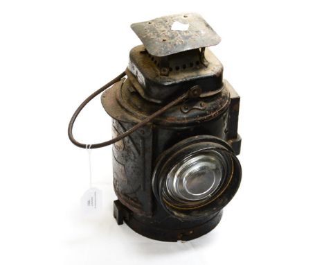 A black Railway lamp LMS Railway label imprinted 'The Aldake non sweating Lamp'