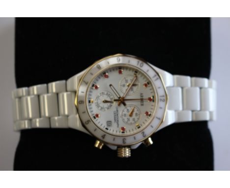 A 'Ardier' ceramic chronograph wristwatch, the white ceramic dial with rubies for numerals and three subsidiary dials, dark a
