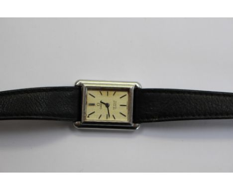  Omega, a ladies steel Omge De Ville Quartz wristwatch, 1.5cm rectangular silvered dial with baton numerals, black leather st