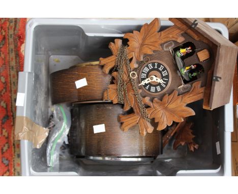 A Cuckoo Clock and two mantle clocks with weights