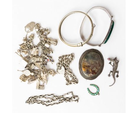 A Victorian turquoise horseshoe shaped charm, silver, a white metal bangle, a silver neck chain and link/locket bracelet, a s