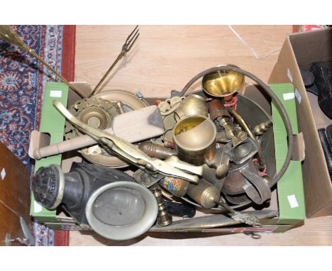 A box containing a collection of various brassware, including candlesticks, tray, figures, carriage lamp, etc 
