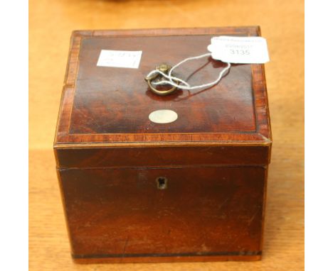 A square, lined, wooden tea caddy 