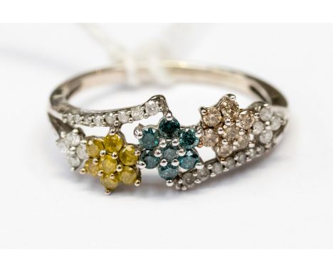 A white yellow and blue diamond set multi cluster white gold ring, ring size S 1/2, gross weight approximately 2.8 grams