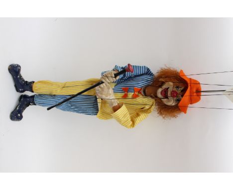 A Chez puppet circa 1950s, paper mache and wood, jointed limbs, wire and string in place