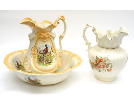 A Staffordshire jug and basin and another Victorian wash jug (3)