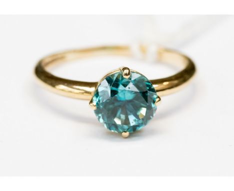 A blue zircon single stone 9ct gold dress ring, size P, gross weight 2 grams approx 